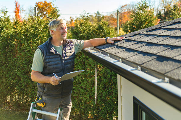 Professional Hail Damage Roof Repair technician working in Wayne, WV